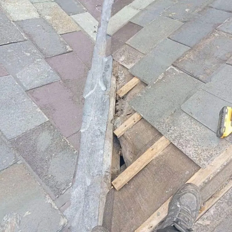 Old leaking roof valley before replacement on property in Cork