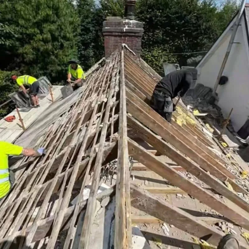 Existing roof fully stripped before new slate roof and insulation installation in Cork